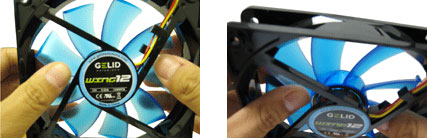 The fan impeller can be removed from the black fan case by applying gentle pressure